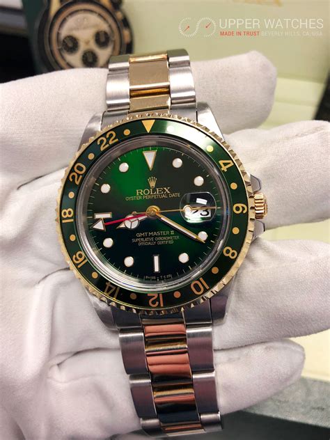 rolex gold gmt 2 green dial|green face gold band rolex.